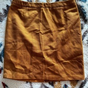 A line above the knee or just below skirt.